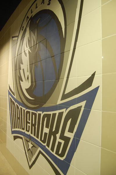 Dallas Mavericks logo set in wall tile at American Airlines Center